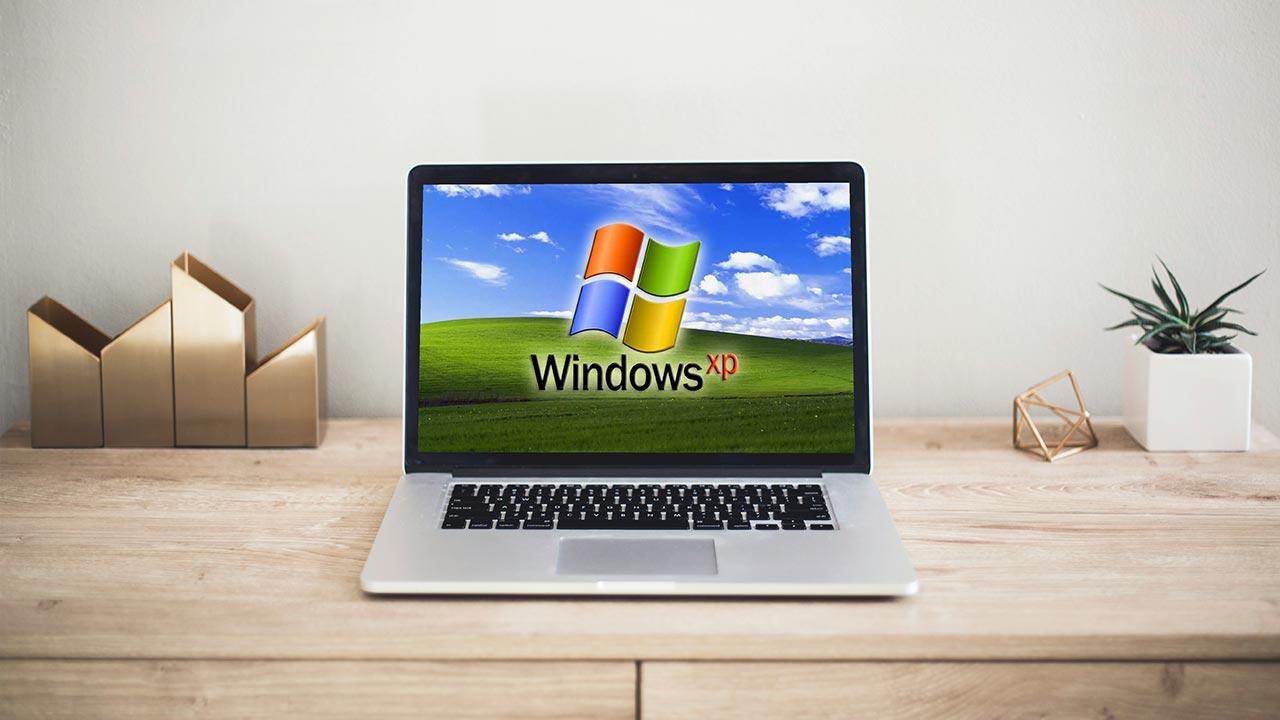 Imagine a touchscreen MacBook running Windows XP – someone has done it